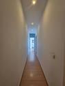 Flur 1.OG richtung Treppe 2 Zimmer Whg 01.jpg - 