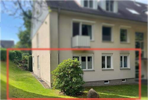 Außenansicht mit Gartenzugang - Einzigartige 4-Zimmer-Wohnung mit Garten, Terrasse, Garage und Keller