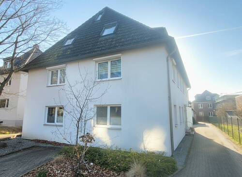 Ansicht - Charmante Eigentumswohnung mit großer Terrasse und PKW-Stellplatz