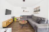Wohnzimmer möbliert - Doppelhaushälfte mit 110,00 m² in Hechthausen zum Kaufen