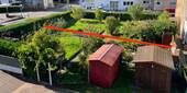 Garten mit Grundstücksgrenze - 