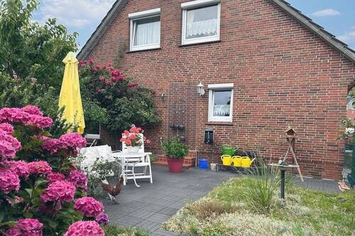 Terrasse - 4 Zimmer Mehrfamilienhaus, Wohnhaus in Wangerland