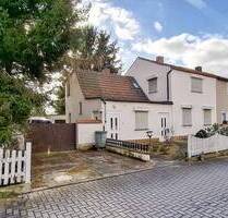 AUKTION: Doppelhaushälfte mit großem Garten in beliebter Siedlungslage - Elsteraue Profen