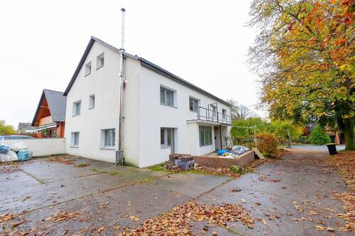 Aussenansicht - MFH hinten.jpg - 1 Zimmer Mehrfamilienhaus, Wohnhaus zum Kaufen in Barsinghausen