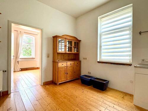 Wohnzimmer Whg. EG links - Mehrfamilienhaus, Wohnhaus mit 380,00 m² in Wunstorf zum Kaufen