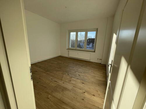 Wohnzimmer WE 1.OG Rechts - 