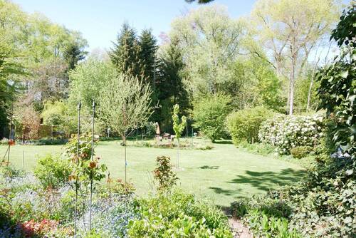 Blick in den Garten.JPG - 8 Zimmer Mehrfamilienhaus, Wohnhaus zum Kaufen in Tornesch
