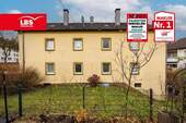 Außenansicht, Gartenseite - Solides Invest: 4-Familienhaus mit Ausbaureserve