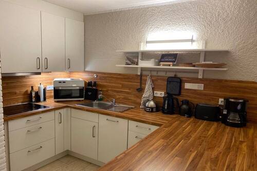 offener Küchenbereich mit EBK - 