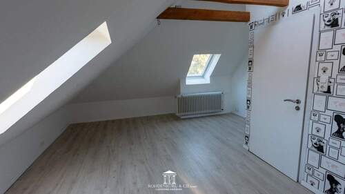 Schlafzimmer im Dachgeschoss - 