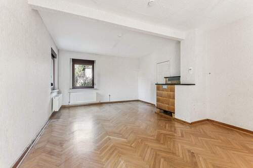 Blick ins Wohnzimmer - Einfamilienhaus mit 100,00 m&sup2; in Schöneiche bei Berlin zum Kaufen