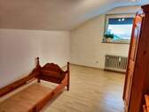 Zimmer im Dachgeschoß - 
