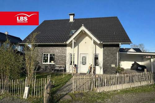 Straßenansicht - Neuwertiges, energieeffizientes Einfamilienhaus in Füchtorf