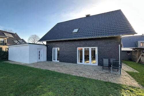 Gartenansicht - 4 Zimmer Einfamilienhaus zum Kaufen in Sassenberg