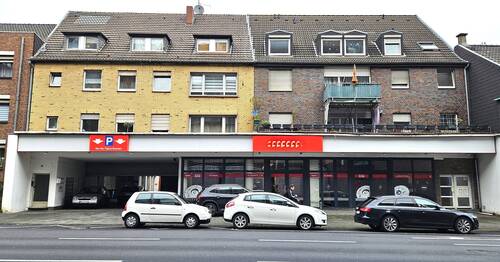 883 Front.jpg - Voll vermietetes Wohn- und Geschäftshaus mit Stellplätzen und Garagen