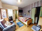 Wohn- und Schlafzimmer mit Abstellraum Apartment EG - 