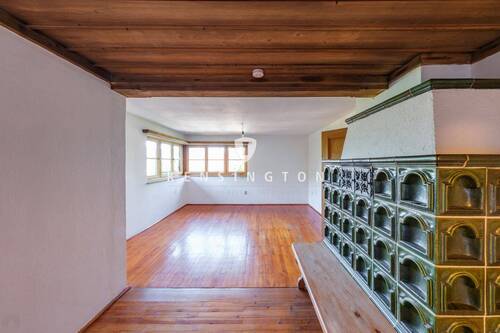 Wohn/Essbereich mit Kachelofen - 6 Zimmer Mehrfamilienhaus, Wohnhaus in Tegernsee / Leeberg