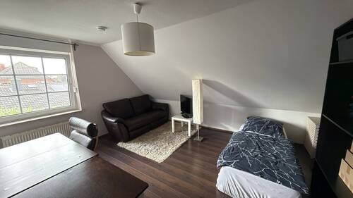 Zimmer im Dachgeschoss - 