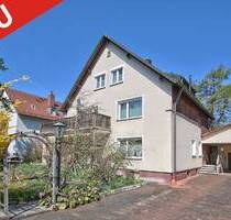 MÜNCHEN: FAMILIENFREUNDLICHES EINFAMILIENHAUS IM SONNENSCHEIN