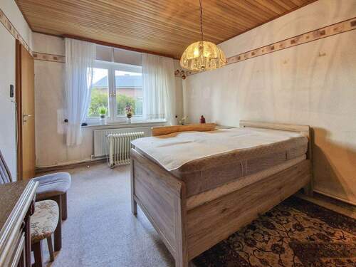 Wohnzimmer im EG - Einfamilienhaus mit 86,00 m² in Hohenlockstedt zum Kaufen