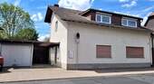Haus und Garage - Wohnen und Arbeiten im Einklang. Wohn- und Geschäftshaus mit einer 3 Zimmer Wohnung, Büroetage und Garage!