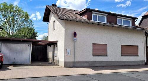 Haus und Garage - Wohnen und Arbeiten im Einklang. Wohn- und Geschäftshaus mit einer 3 Zimmer Wohnung, Büroetage und Garage!