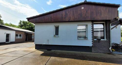 Seitenansicht Haus1 - 7 Zimmer Mehrfamilienhaus, Wohnhaus zum Kaufen in Gießen