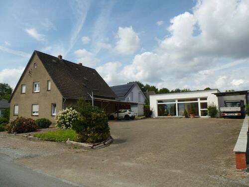 H-S-167-Haus und Ladenlokalansicht - Mehrfamilienhaus, Wohnhaus in Enger