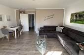 24408971_1-Wohn- und Essbereich.jpg - 2 Zimmer Etagenwohnung in Brodersby