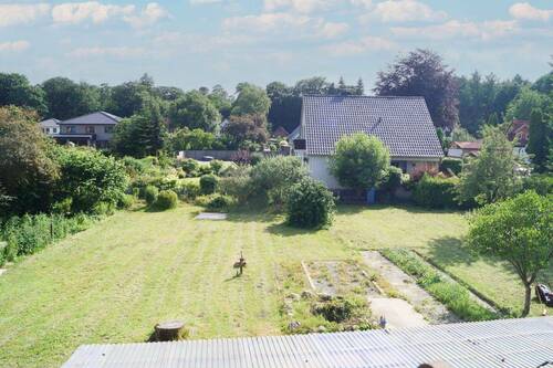 Blick in den Garten - Einfamilienhaus mit 250,70 m² in Geestland zum Kaufen