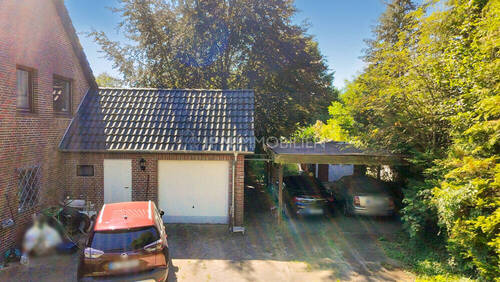 Garage und Doppelcarport - 