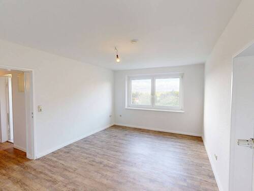 Ansicht I: Wohnzimmer - Wohnen mit Ausblick: Lichtdurchflutete 2-Zimmer-Wohnung