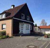 Charmante Doppelhaushälfte mit Hobbyraum, Garagen und idyllischem Garten in Mettmann