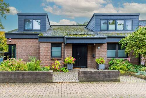 Außenansicht - LENAU - Ankommen und wohlfühlen: Architektenhaus mit viel Platz in Godshorn!