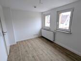 Ansicht II: Wohnzimmer - 1 Zimmer Etagenwohnung zur Miete in Erlenbach am Main