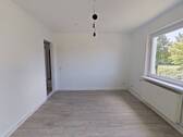 Ansicht III: Wohn- und Esszimmer - 3 Zimmer Etagenwohnung in Nordenham