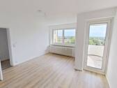 Ansicht I: Wohn- und Esszimmer - Moderne 2-Zimmer-Wohnung mit EBK, sonnigem BALKON und tollem Ausblick