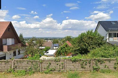 Ausblick/Straßenansicht - Attraktives Baugrundstück mit Weitblick über Bielefeld in ruhiger Wohnlage