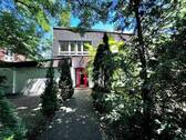 Ansicht - Dahlemer Bestlage direkt am Messelpark: sehr geräumiger, komplett sanierter Bungalow mit Atrium-Garten im angesagten Stil der 60er Jahre
