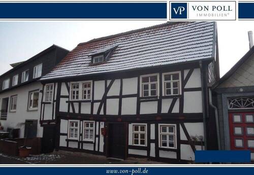 Haus Logo - Charmantes Einfamilienhaus in Top-Lage mit vielseitig nutzbarem Laden