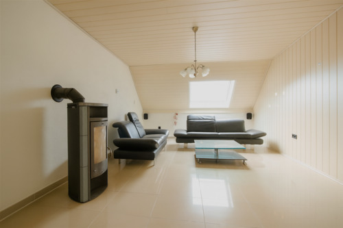 Wohnzimmer DG - 9 Zimmer Einfamilienhaus zum Kaufen in Stemwede