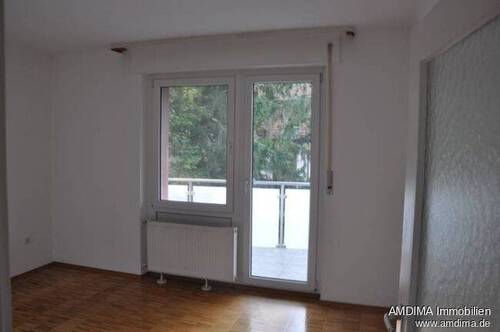 Schlafzimmer mit Zugang zum Balkon - 