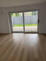 Wohnzimmer mit Schiebetür - 3 Zimmer Terrassenwohnung in Hanerau-Hademarschen