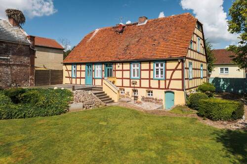 Gartenansicht - 8 Zimmer Einfamilienhaus zum Kaufen in Milower Land