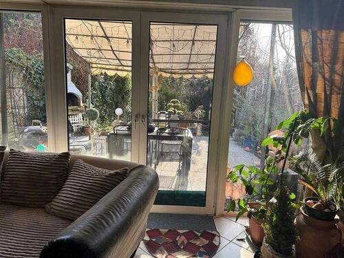 Traumhafte Terrasse mit gemauerten Außenofen. - 