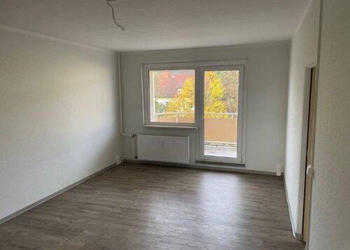 Wohnzimmer mit Balkon - 