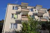 Rückansicht mit Balkon - 2 - Zimmer-Wohnung im dritten Obergeschoß