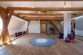 Dachstudio mit Sichtdachstuhl - 