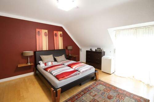 Schlafzimmer mit Balkon - 