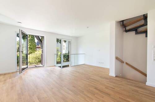 Wohnbereich im ersten Obergeschoss mit Balkon - 